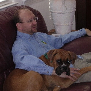 Marcella snuggles with dad
