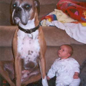Mugsy hanging with baby