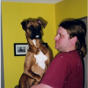 Our little puppy is starting to look like a DOG!!