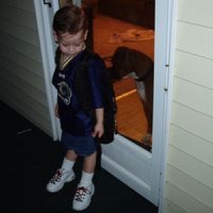 Hey boy,  you don't really want to go to school do ya??