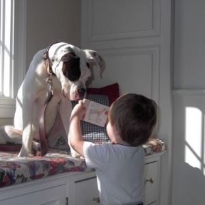 Roscoe, reading to my brother