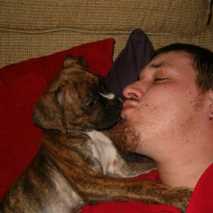 Cassius giving kisses to daddy