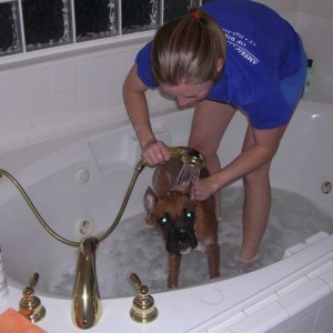 Mommy giving Mav a bath!! EWW stinky boy!!