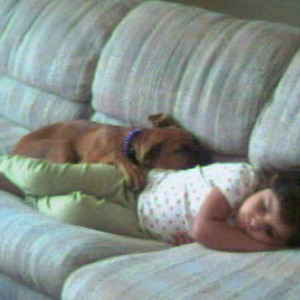Samantha and Raevyn watching TV