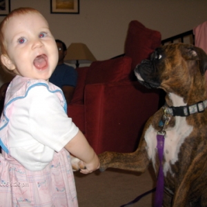 Gracie shaking with the baby