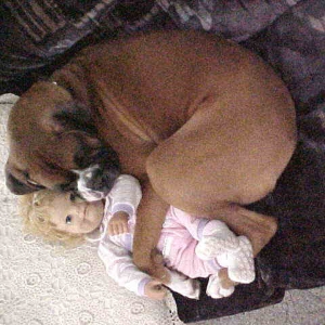 Otis sleeping with baby doll