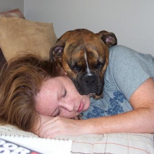 Oscar napping with momma