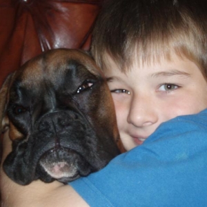 Ruby enjoying a hug from my youngest son