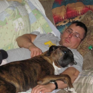 ZUES AND DAD WATCHING FOOTBALL