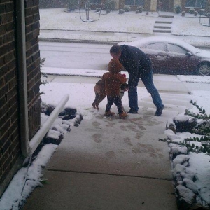 Aiden_Christmas_Snow_with_Tank_the_Boxer_2012_Low_Res