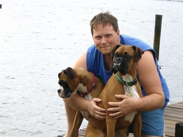 Dad and Dogs on the dock
