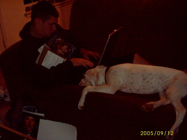 Dempsey is helping daddy study!