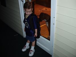 Hey boy,  you don't really want to go to school do ya??