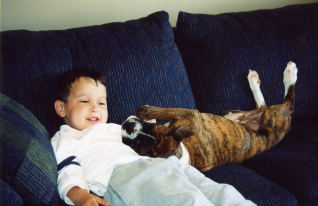 His Favorite Spot --- the Couch w/ our son!