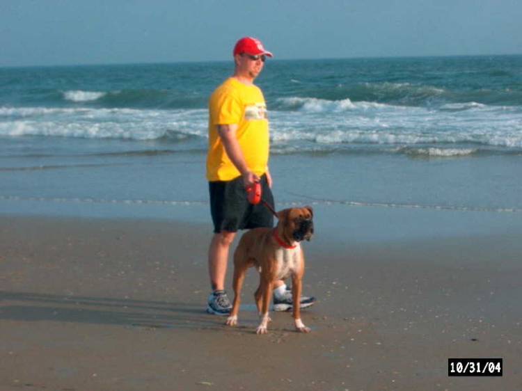 Junior Pulling Daddy Around the Beach