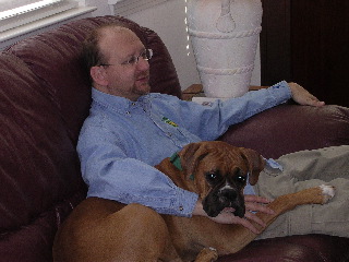 Marcella snuggles with dad