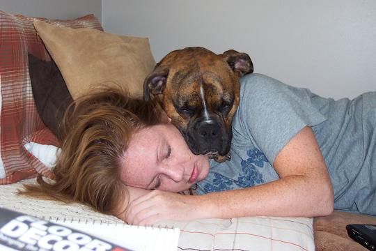 Oscar napping with momma