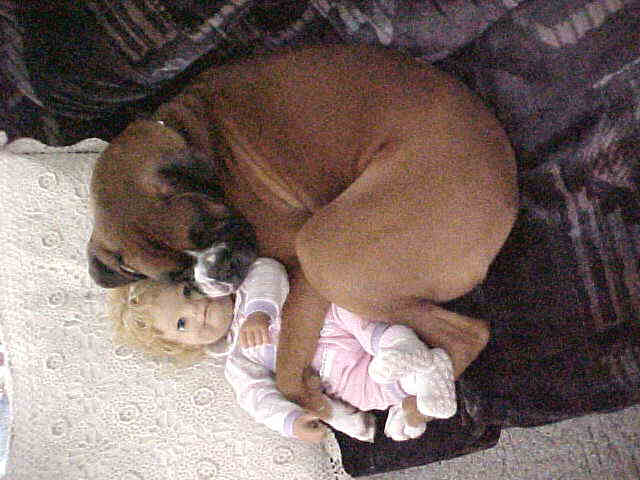 Otis sleeping with baby doll