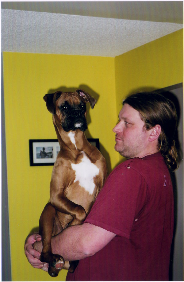 Our little puppy is starting to look like a DOG!!