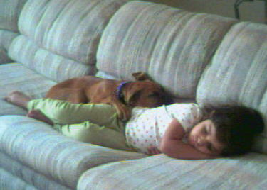 Samantha and Raevyn watching TV