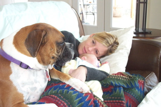 Sunday snuggles with the new baby Feb '03