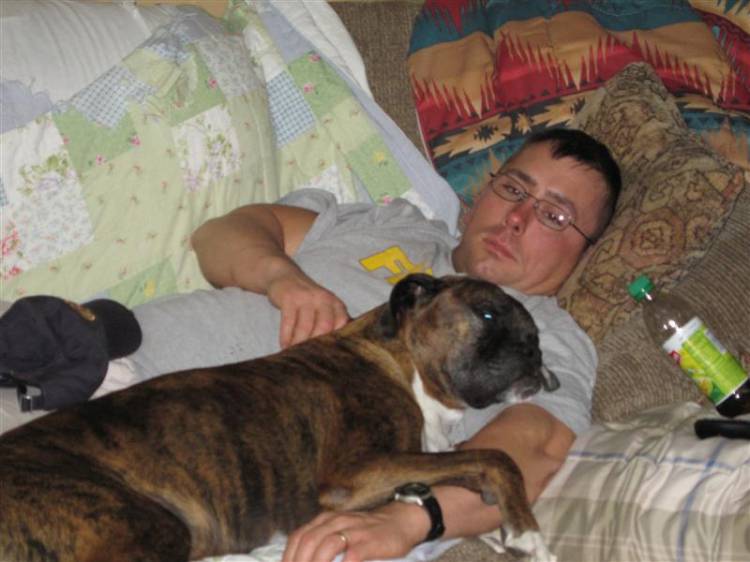 ZUES AND DAD WATCHING FOOTBALL